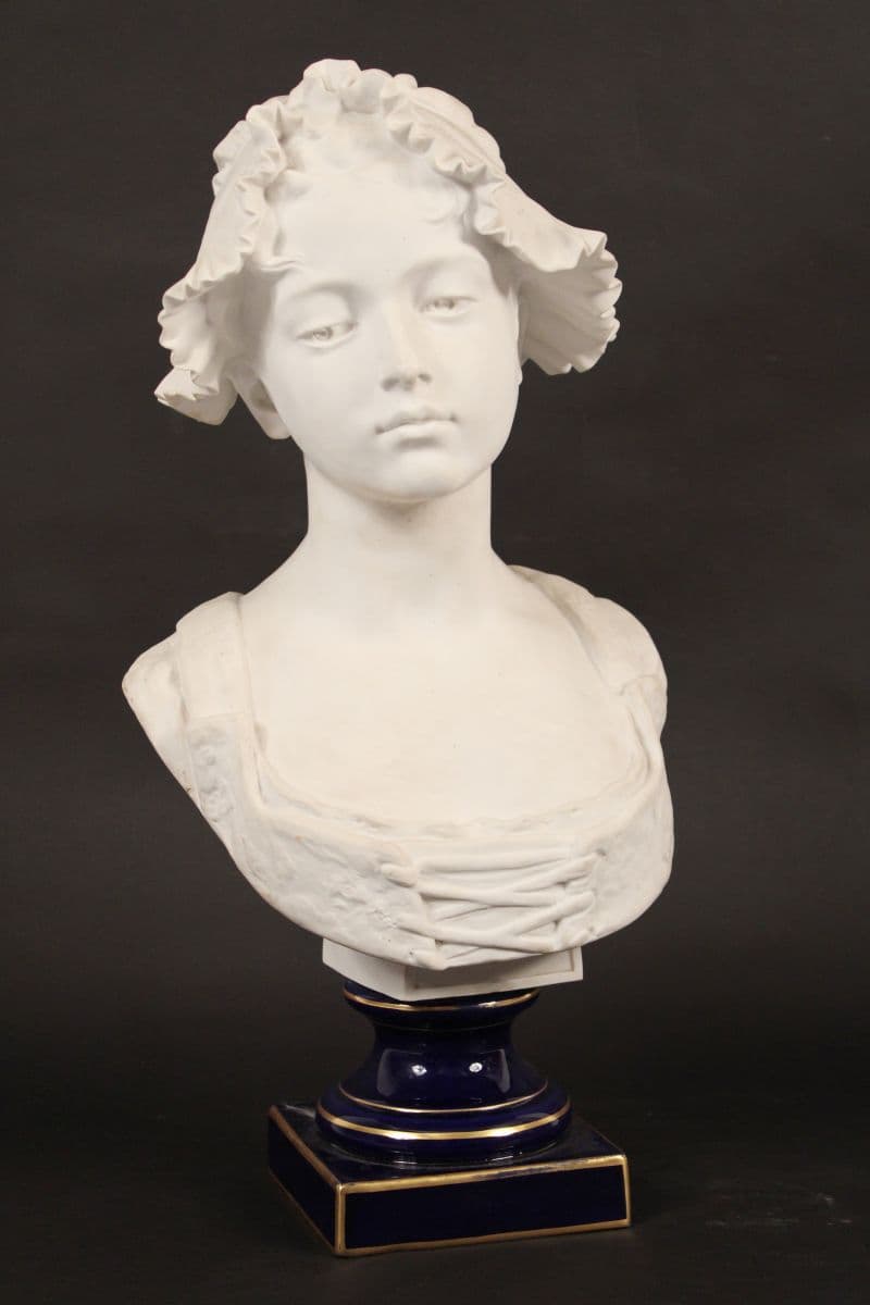 Bisque bust of a young girl, signed F. Trolli