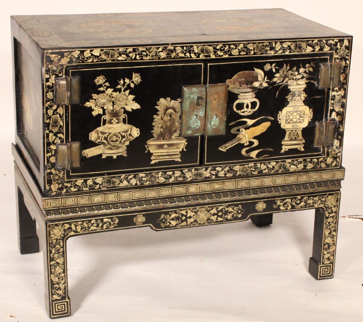Chinese Black Lacquer and Gilt Decorated Cabinet on Stand