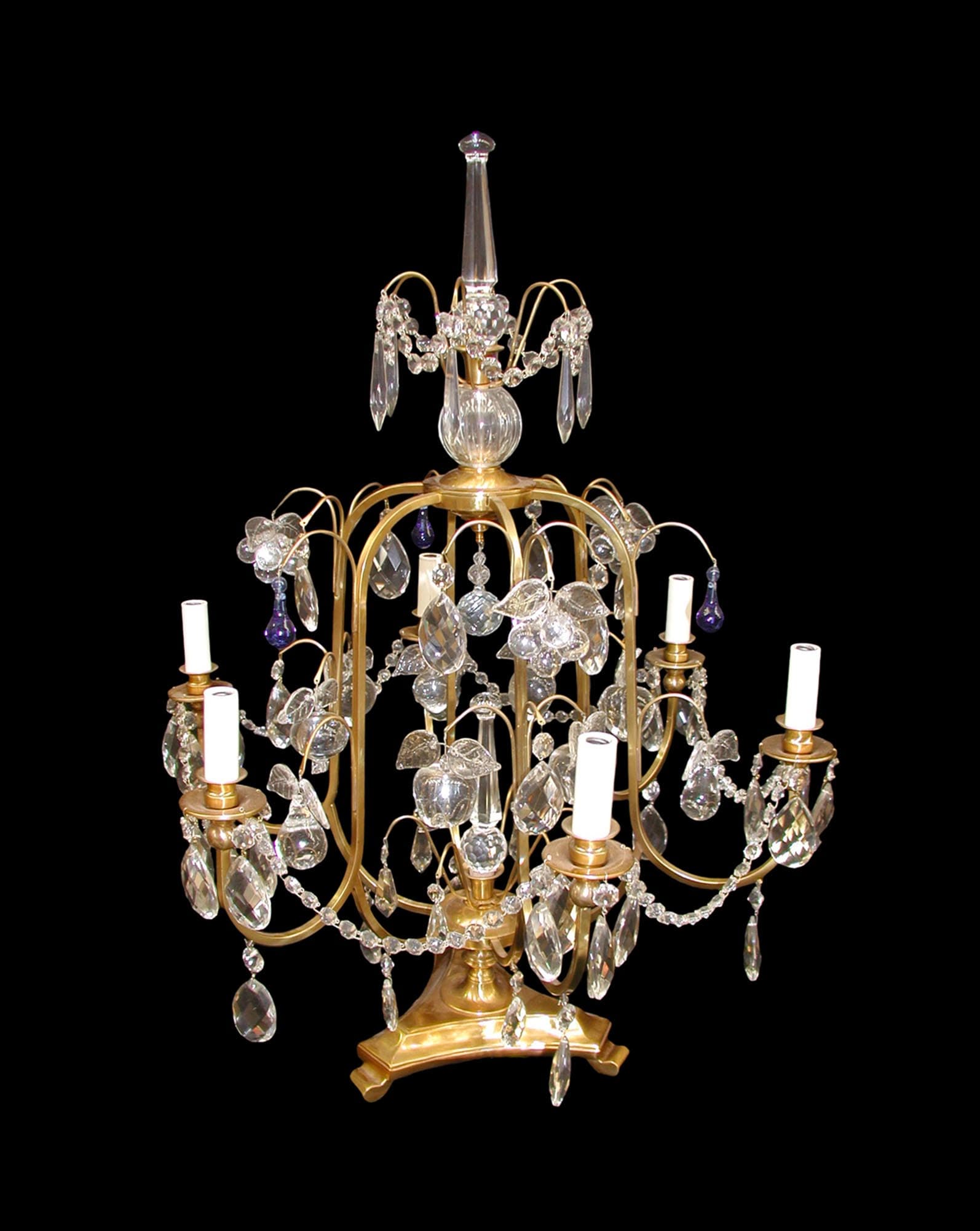 Victorian five-arm table lamp with a gold finish, clear and blue teardrop crystals, and wired candle-style bulb holders.