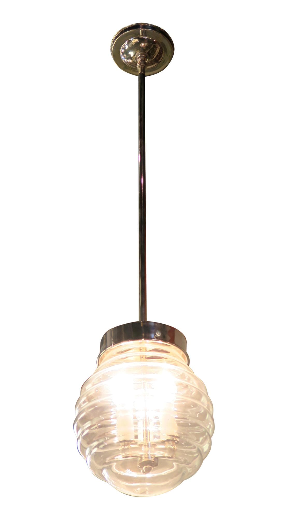 Clear glass beehive pendant light with a polished nickel stem and round canopy, showing the ribbed shade and three candelabra bulbs.
